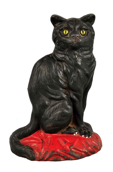 CAST IRON BLACK CAT WITH YELLOW EYES DOORSTOP.    