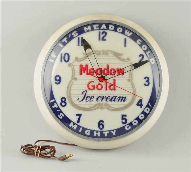 MEADOW GOLD ICE CREAM WALL CLOCK.