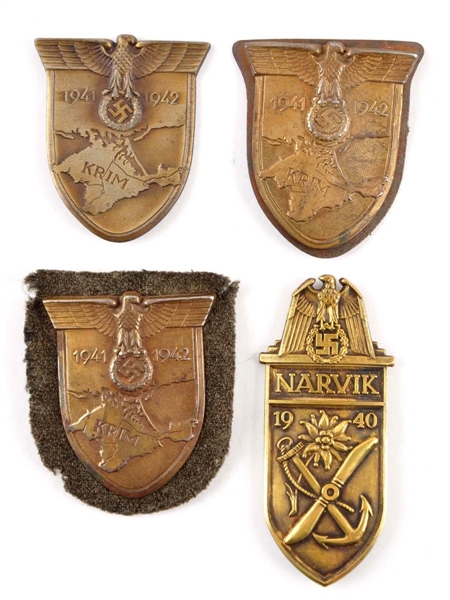 LOT OF 4: GERMAN WWII CAMPAIGN SHIELDS.           