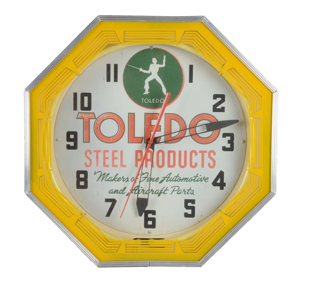 TOLEDO STEEL PRODUCTS NEON CLOCK.                 