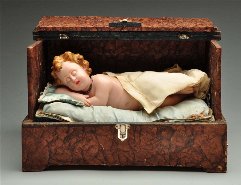 ANTIQUE MUSIC BOX WITH WAX BABY.              