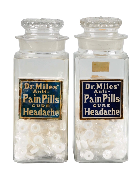 PAIR OF DR. MILES PAIN PILLS APOTHECARY JARS.