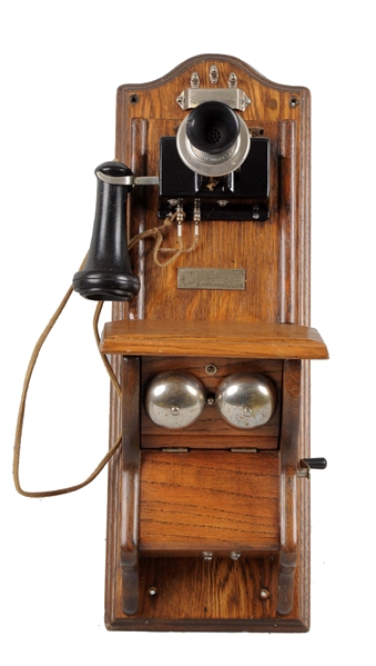 OAK WALL PHONE BY NORTH ELECTRIC COMPANY.