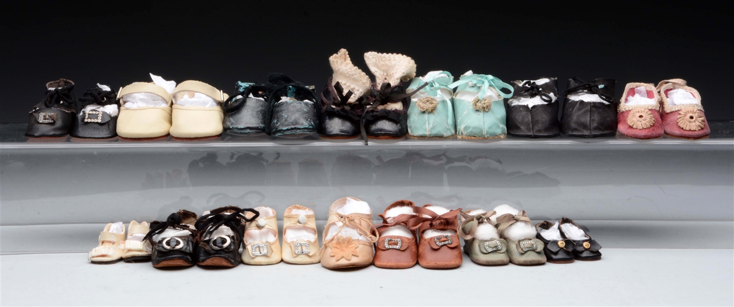 LOT OF 14: PAIRS OF DOLL SHOES.                   