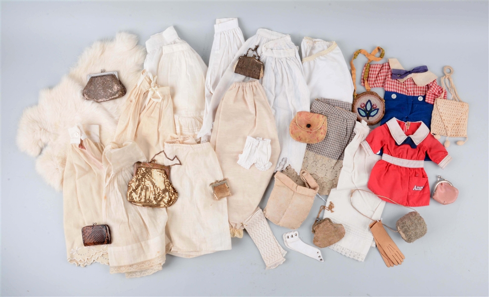 LOT OF DOLL ACCESSORIES & CLOTHING.               