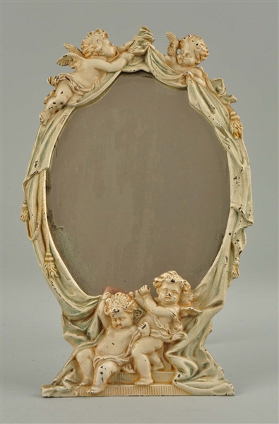 CAST IRON CHERUB FRAME WITH BEVELED MIRROR 