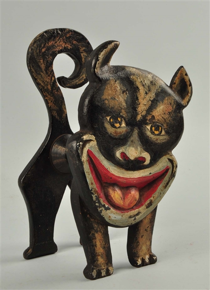 CAST IRON LAUGHING WHIMSICAL DOG FIGURINE STATUE.