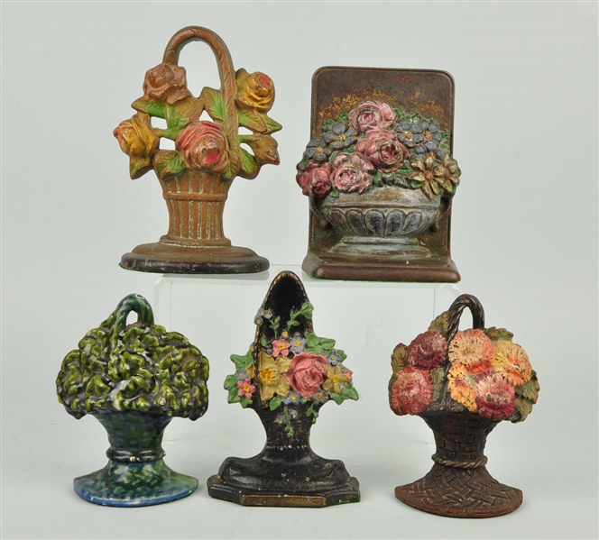 LOT OF 5: CAST IRON ASSORTED FLORAL DOORSTOP & BOOKENDS.