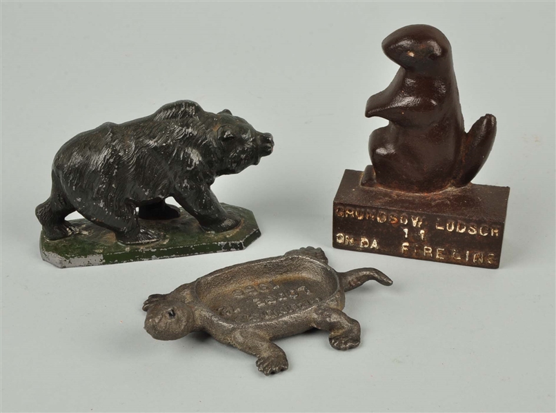 LOT OF 3: CAST IRON ASSORTED ADVERTISING PAPERWEIGHTS.