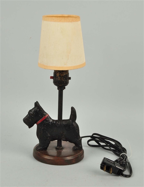 CAST IRON SCOTTIE LAMP.