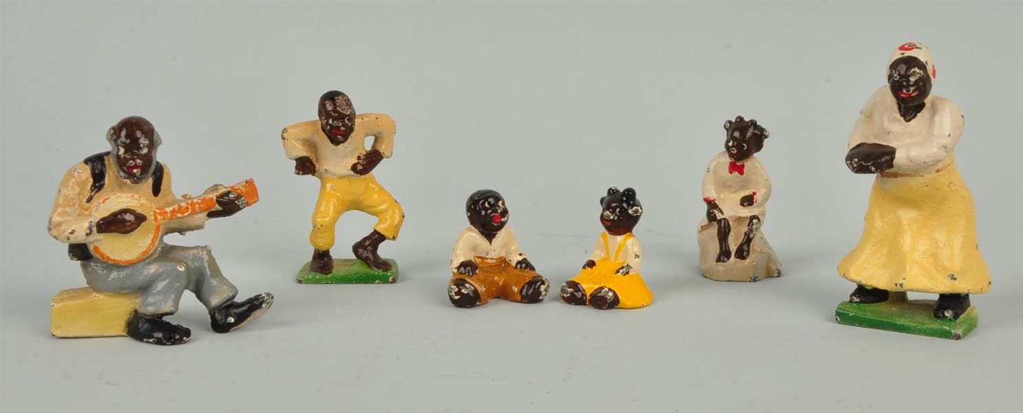 LOT OF 6: CAST IRON ASSORTED BLACK FIGURES.