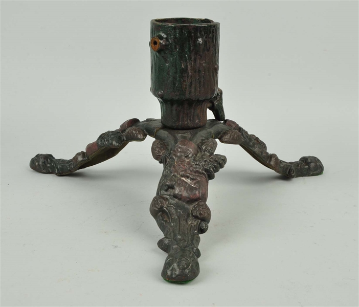 CAST IRON FATHER CHRISTMAS TREE STAND.