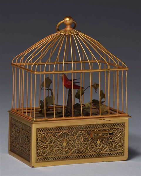 BIRD IN A SNUFF BOX IN A DOMED CAGE.              