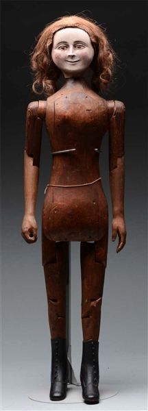 32" WOODEN "SMUGGLING" DOLL.                      