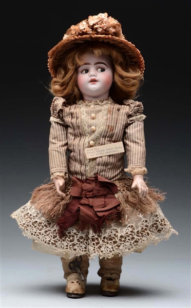 FRENCH MECHANICAL WALKING DOLL.                   