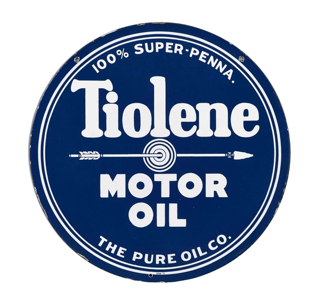 TIOLENE MOTOR OIL W/ ARROW PORCELAIN SIGN.