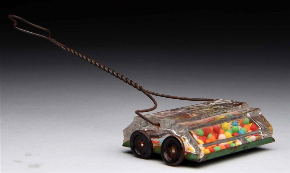 BABY CARPET SWEEPER CANDY CONTAINER.  