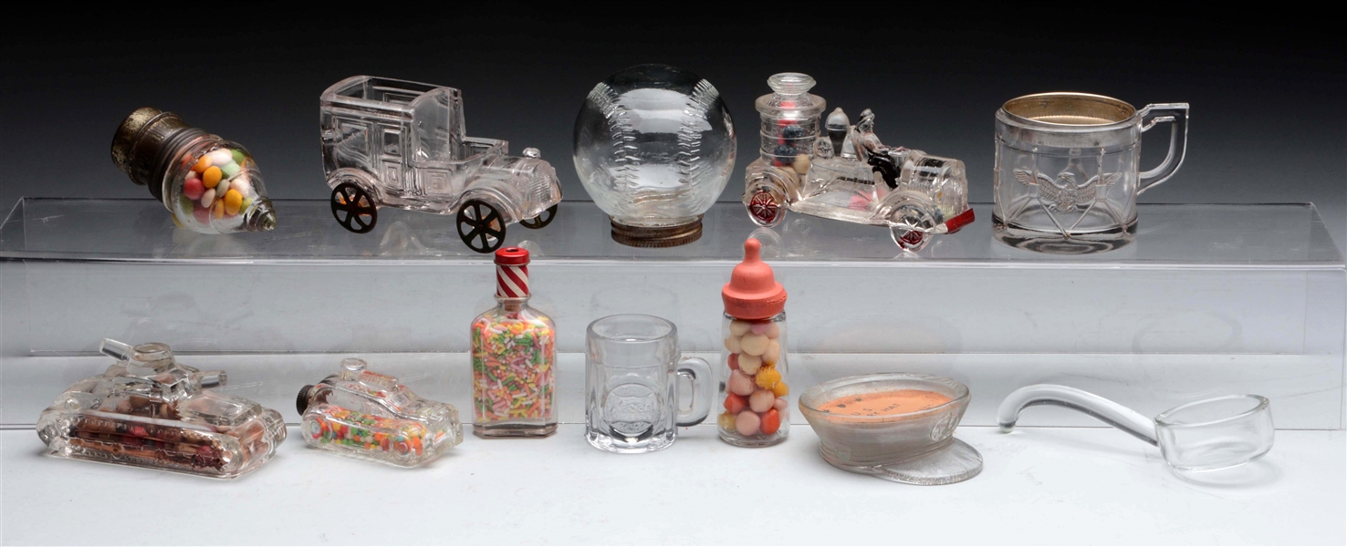 LOT OF 12:  ASSORTED GLASS CANDY CONTAINERS.      