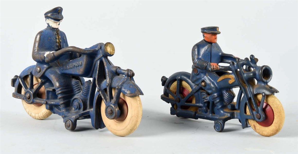 LOT OF 2: CAST IRON POLICE MEN ON MOTORCYCLE. 