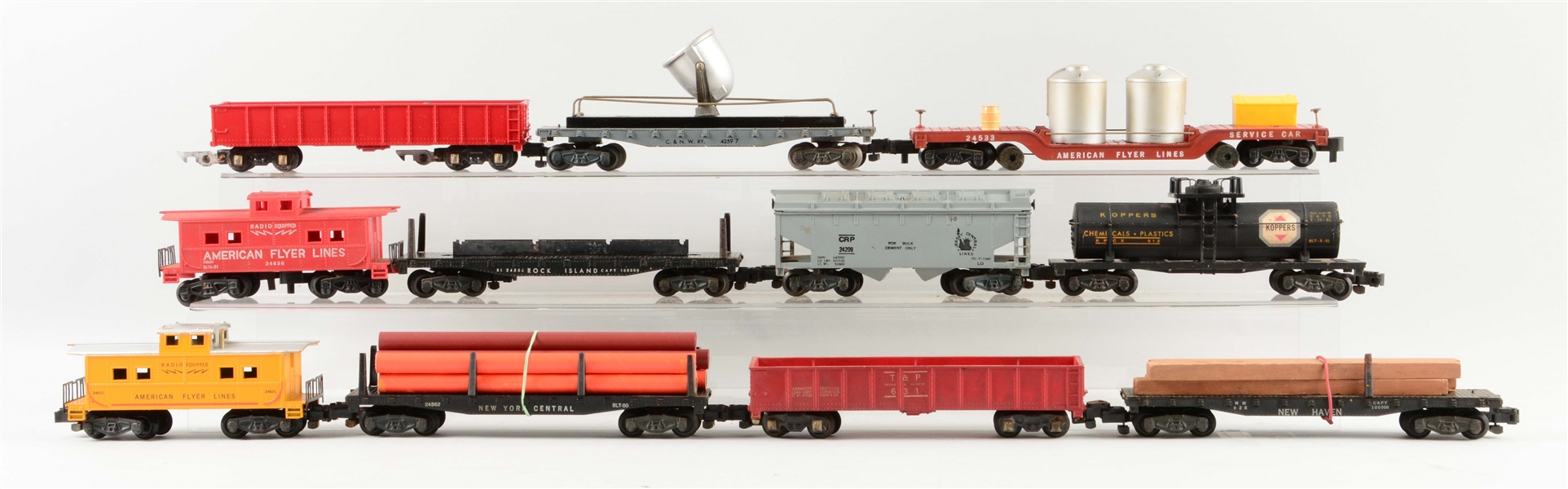 LOT OF 11: ASSORTED AMERICAN FLYER FREIGHT CARS. 
