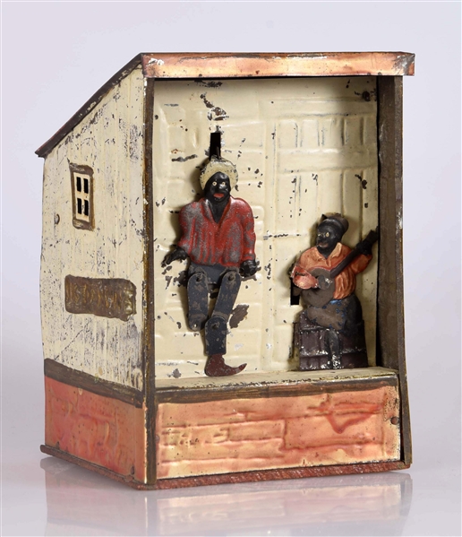 WEEDEN PLANTATION DARKY TIN MECHANICAL BANK.