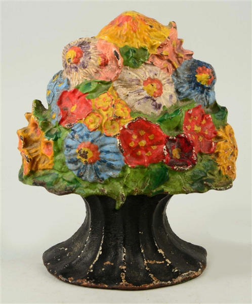 CAST IRON OLD FASHION MIXED FLOWERS DOORSTOP.