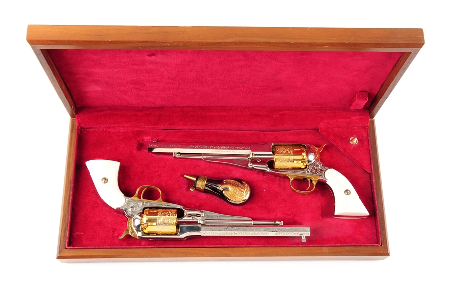 (A) CASED LIMITED EDITION PEITTA ENGRAVED AND PLATED PAIR OF MODEL 1858 REMINGTON REVOLVERS.