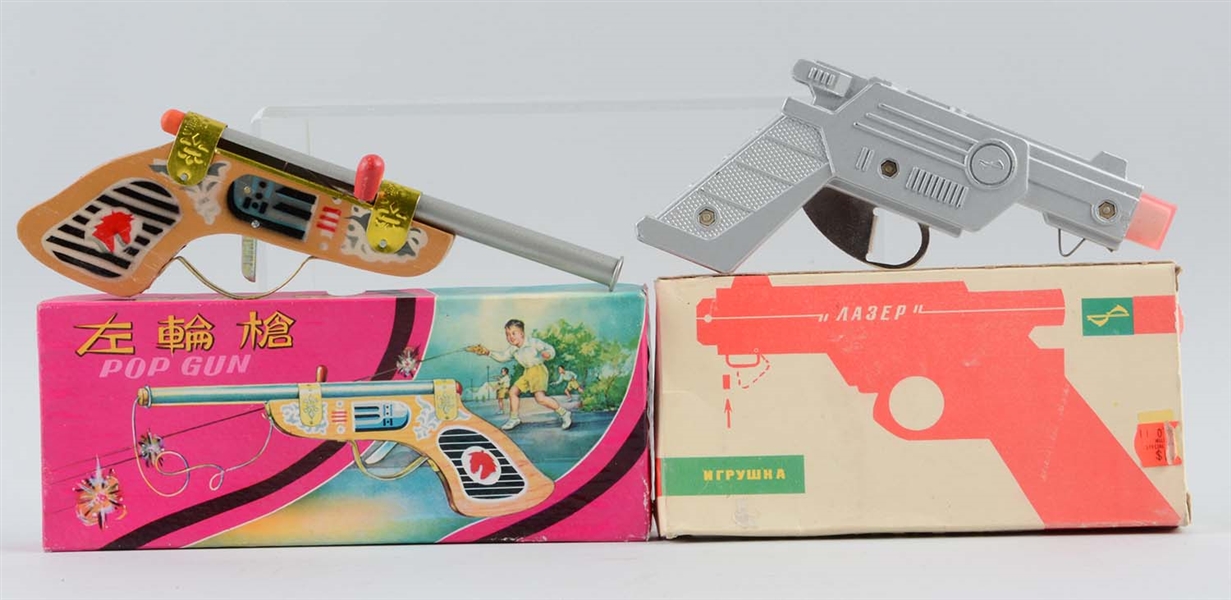 LOT OF 2: VINTAGE FOREIGN TOY GUNS.