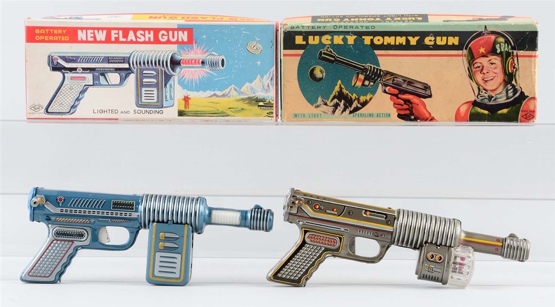 LOT OF 2: JAPANESE TIN LITHO BATTERY OPERATED SPACE GUNS.