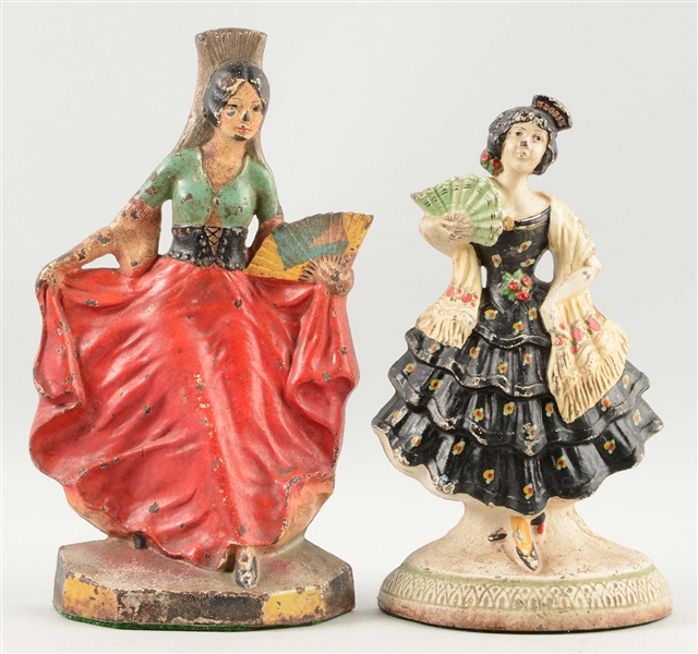 LOT OF 2: CAST IRON ASSORTED LADIES W/ FAN DOORSTOPS.