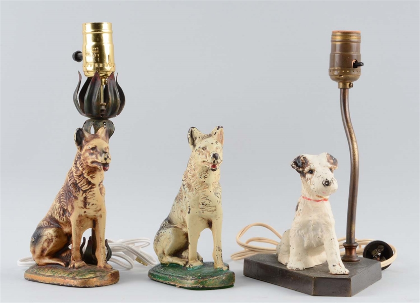 LOT OF 3: CAST IRON DOG LAMPS.