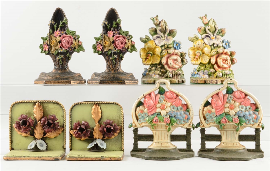 LOT OF 4 PAIRS: CAST IRON ASSORTED FLOWER BOOKENDS.