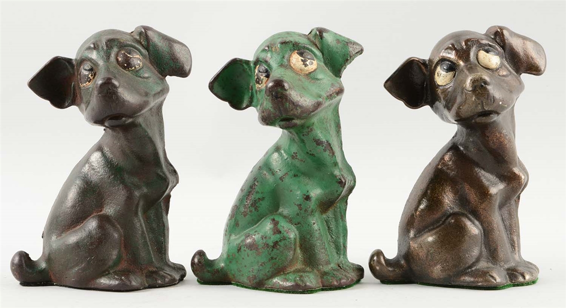 LOT OF 3: CAST IRON ASSORTED DOG BOOKENDS.