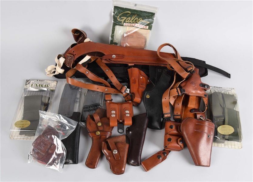 LARGE LOT OF HOLSTERS, MAGS & ACCESSORIES.