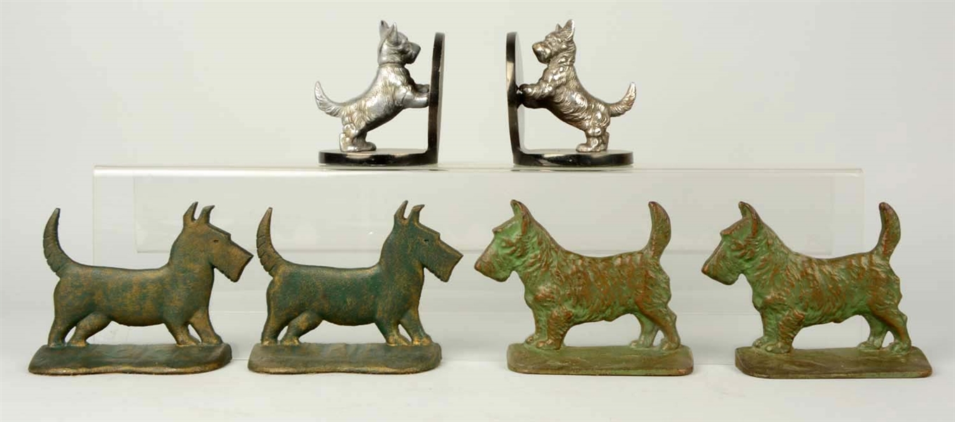 LOT OF 3 PAIRS: CAST IRON ASSORTED SCOTTIE DOG BOOKENDS.