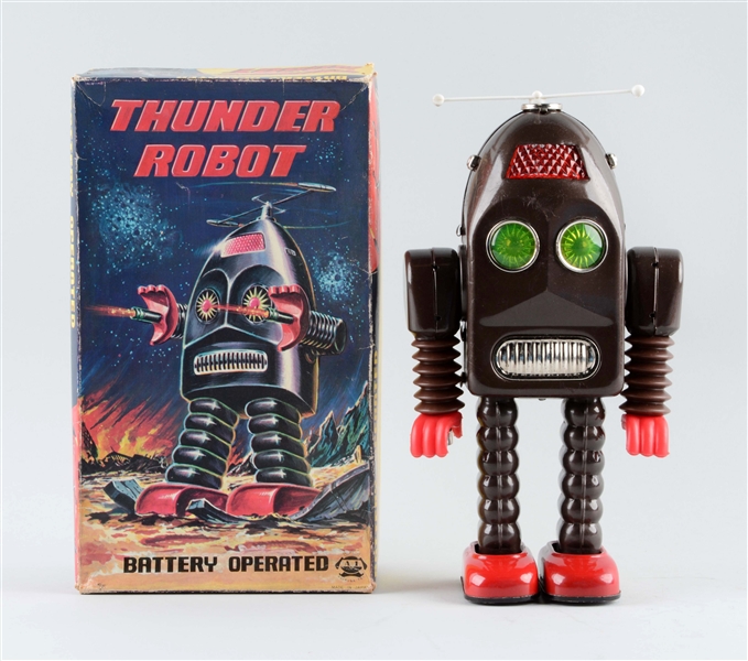 JAPANESE TIN LITHO BATTERY OPERATED THUNDER ROBOT.