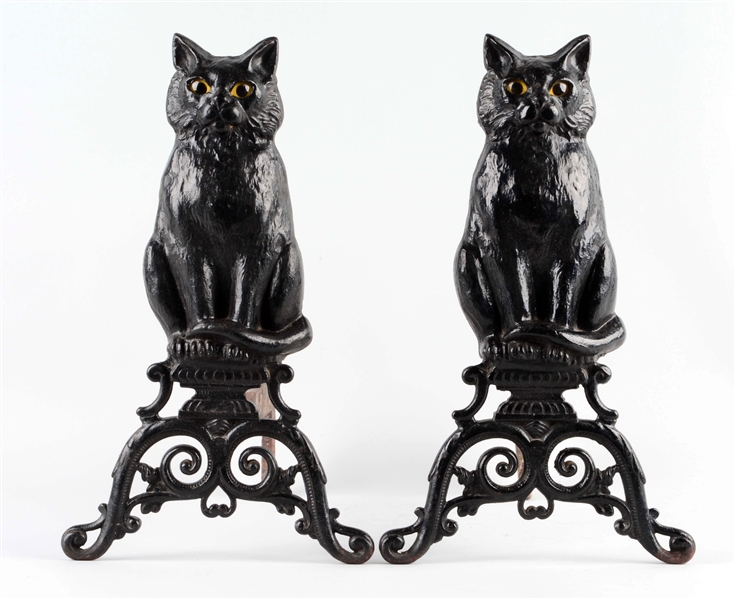 CAST IRON SITTING CAT ON BASE ANDIRONS.