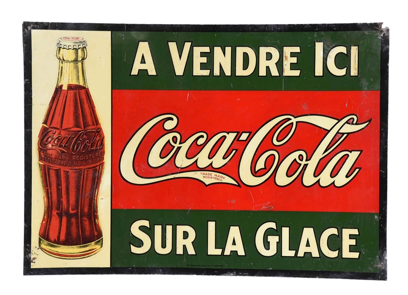 1920S FRENCH- CANADIAN EMBOSSED TIN SIGN.