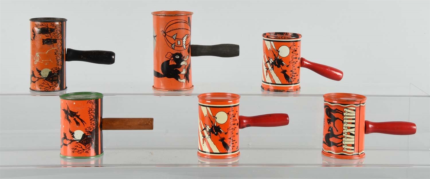 LOT OF 6: VINTAGE HALLOWEEN TIN RATTLES WITH WOODEN HANDLES.