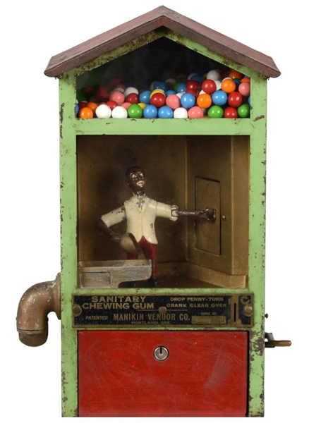 1¢ MANIKIN VENDOR CO. BAKER BOY GUM BALL VENDING MACHINE