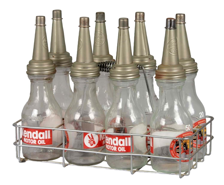 8-PACK OF OIL BOTTLES IN WIRE CARRIER
