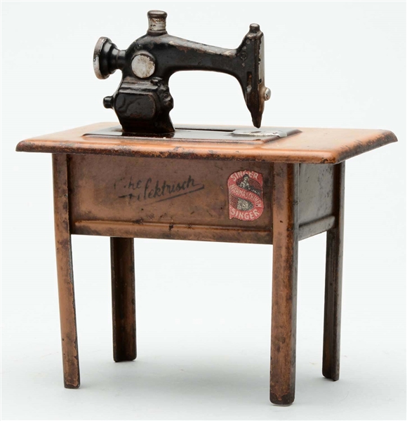 GERMAN TIN & CAST IRON SEWING MACHINE STILL BANK.