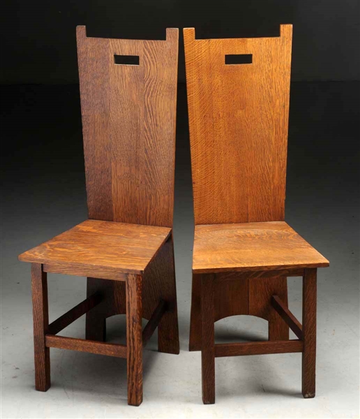 PAIR OF PRAIRIE STYLE PLANK CHAIRS WITH CUTOUTS.