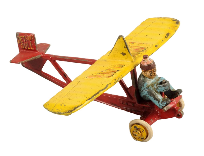 LARGE CAST IRON LINDY GLIDER W/ REMOVABLE FIGURE.