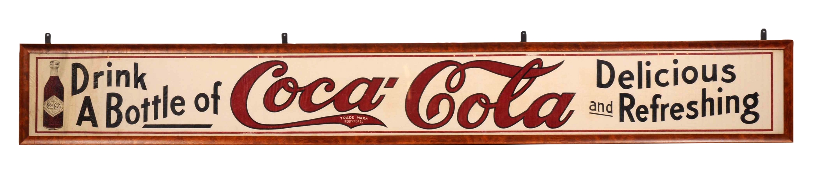 1910 COCA-COLA FRAMED ADVERTISING BANNER.