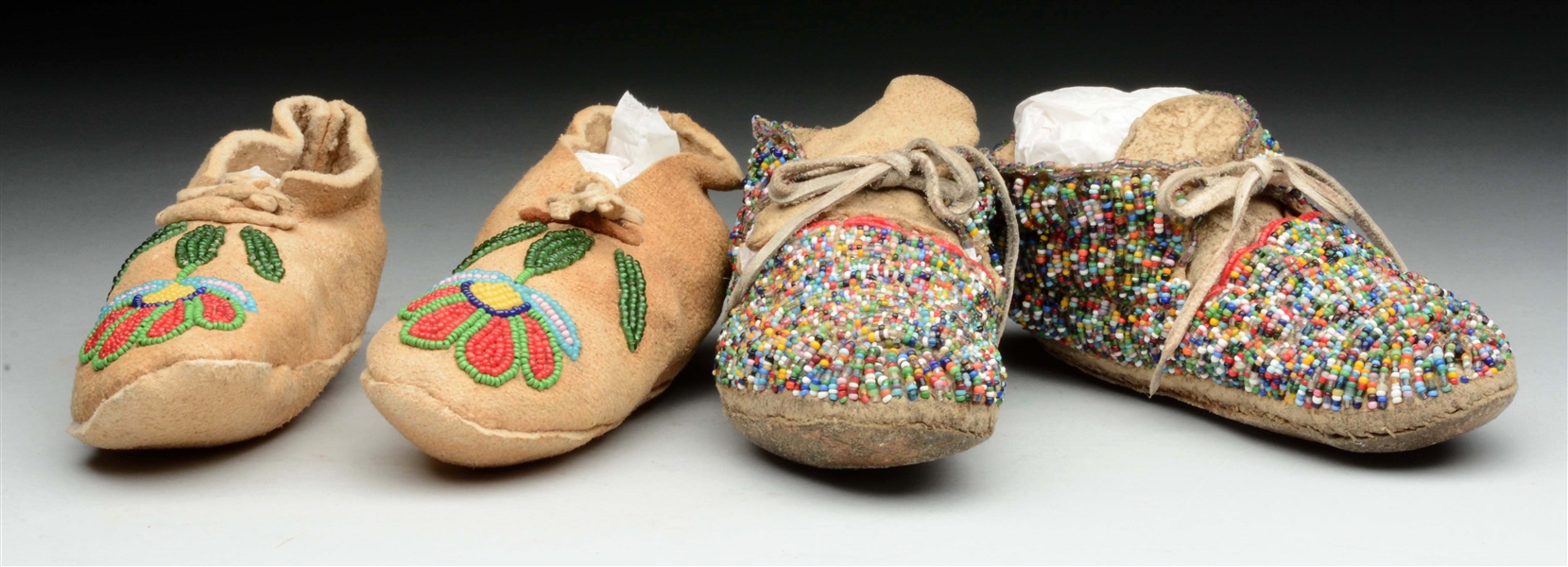 LOT OF 2: PAIRS OF CHILDRENS PLAINS MOCCASINS.