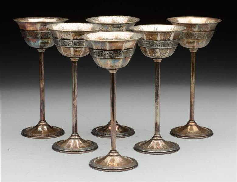 LOT OF 6: ARTS & CRAFTS STYLE SILVER GOBLETS.