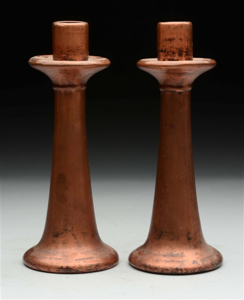 PAIR OF SIGNED ARTS & CRAFTS CANDLESTICKS. 