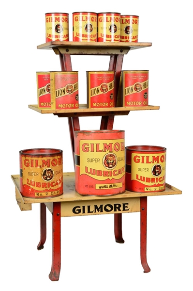 GILMORE MOTOR OIL CAN RACK WITH VARIOUS CANS. 