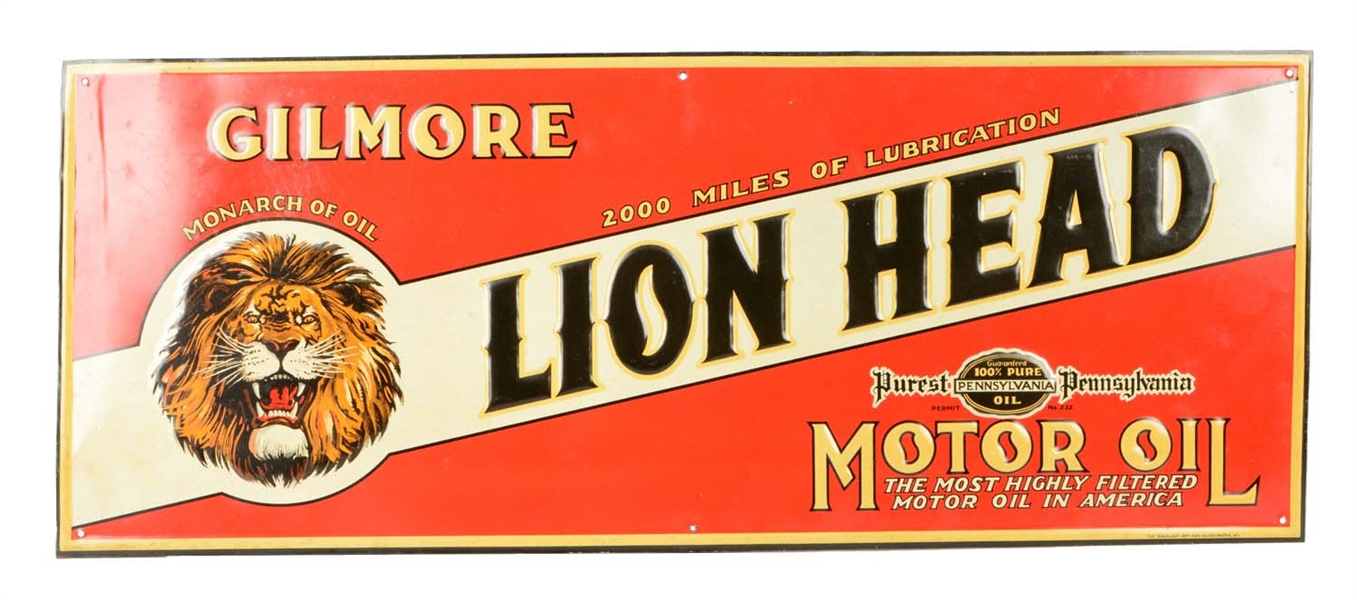 GILMORE LION HEAD EMBOSSED TIN TACKER SIGN. 